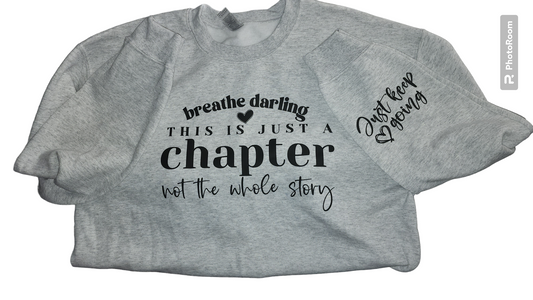 Breath Darling and on sleeve just keep going crewneck